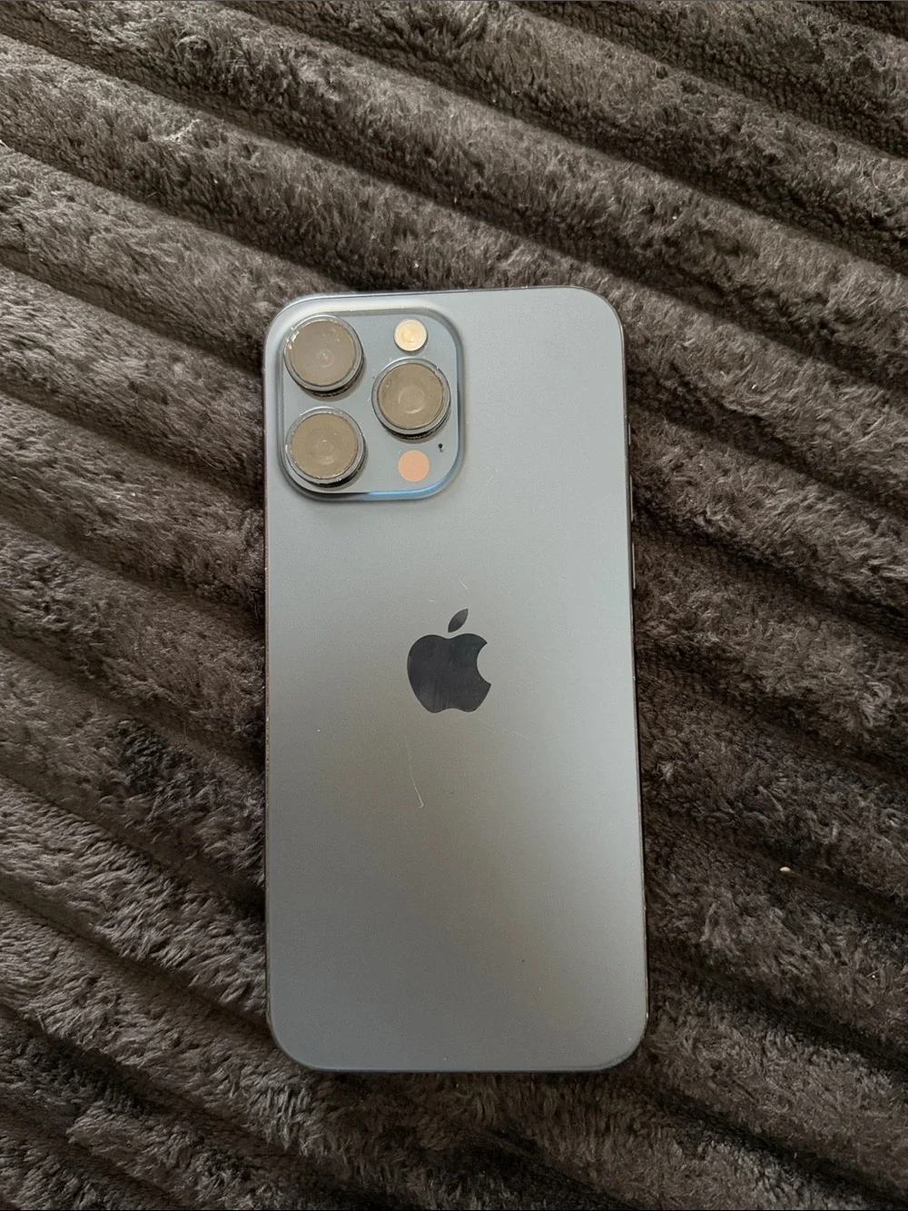 Apple iPhone in Black with Blue-Green Display Accent